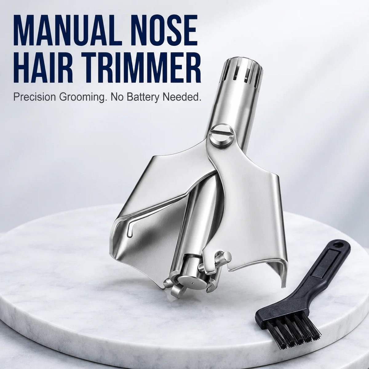 Stainless steel manual nose hair trimmer shown with a small brush