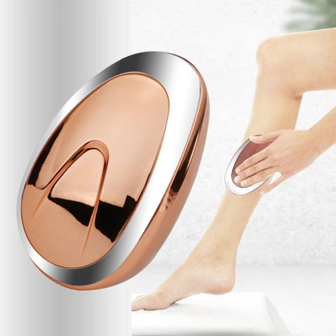 Gold oval hair-removal tool beside a leg