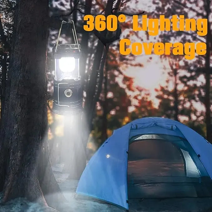 Lantern hanging near a tent at dusk