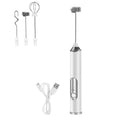 White handheld electric milk frother with interchangeable heads and USB cable